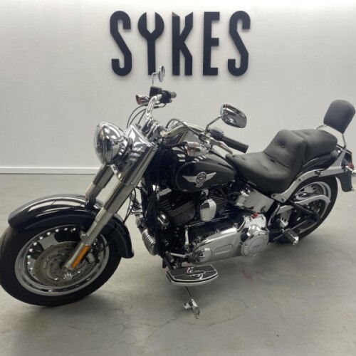 2010 Harley-Davidson FLSTF Softail Fat Boy in Vivid Black thumb 1